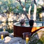 Candlelit hot tub by the river