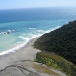 Flying down the wilderness of the West Coast towards Milford Sound
